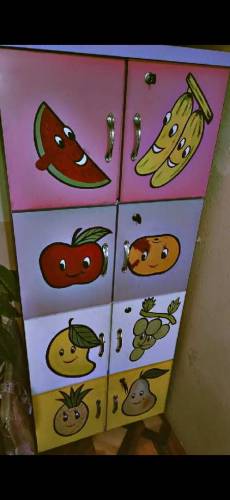 kids bed and medium size cute cupboard