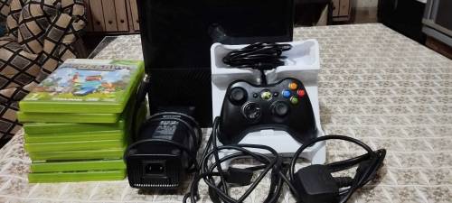 xbox 360 ultra slim new condition with free cds