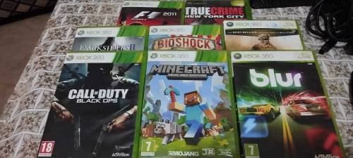 xbox 360 ultra slim new condition with free cds