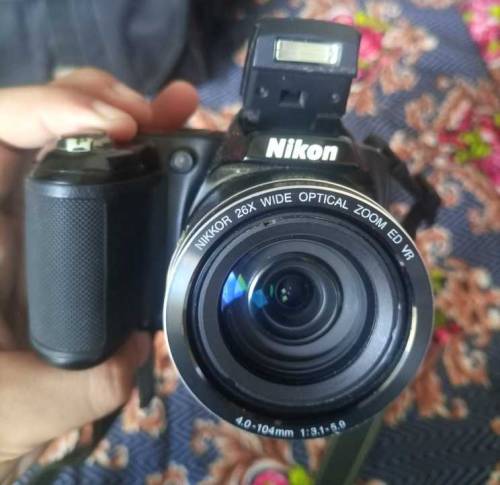 NIKON COOLPIX (SLR) WITH 26x ZOOM