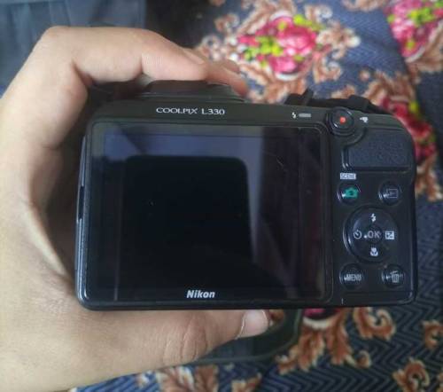 NIKON COOLPIX (SLR) WITH 26x ZOOM