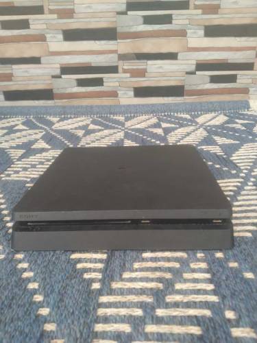 PS4 Slim 1TB with 4 games 