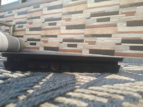 PS4 Slim 1TB with 4 games 