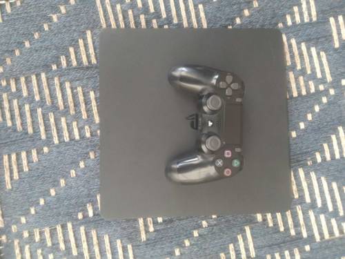 PS4 Slim 1TB with 4 games 
