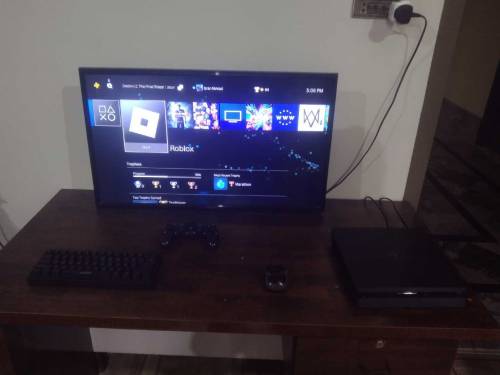 PS4 Slim 1TB with 4 games 