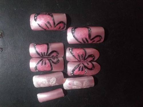 Artificial hand made nails in only RS450 with free sheeping..jewellery