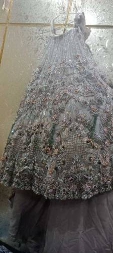 i want to sell bridal women dress with full of work and long tail back