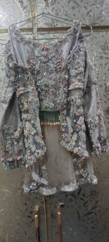 i want to sell bridal women dress with full of work and long tail back