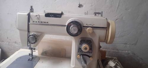 imported janome sewing machine with all attachments 