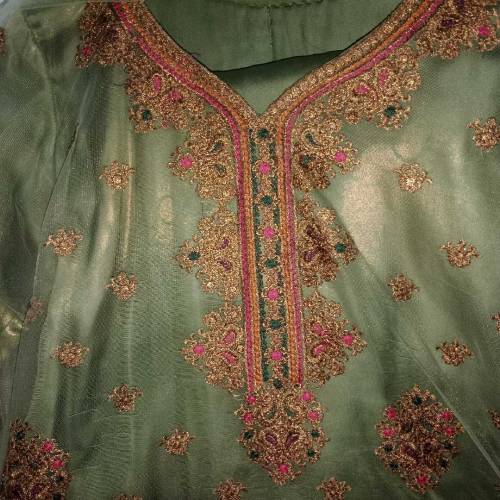 Stitched Net embroided three piece suite with net dupatta and inner 