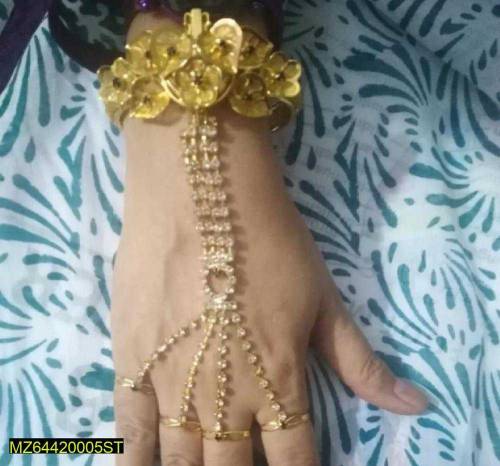 woman's golden watch 