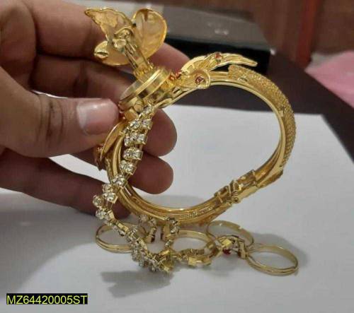 woman's golden watch 