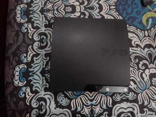 PS3 SLIM with 17 cds and 2 controller one controller is damaged but wo
