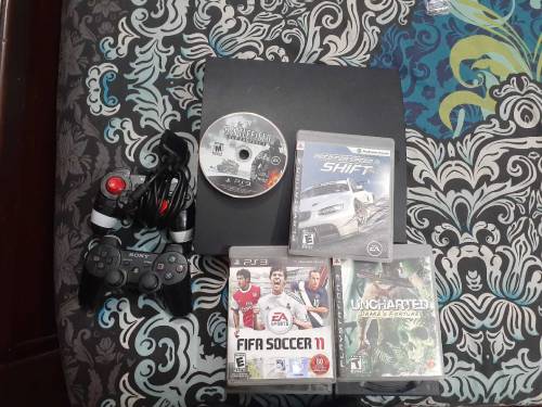 PS3 SLIM with 17 cds and 2 controller one controller is damaged but wo