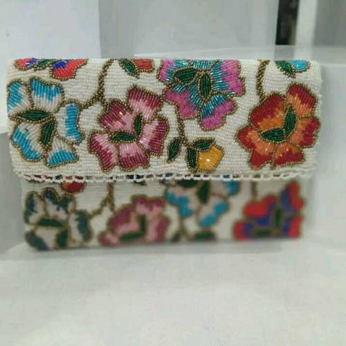 Handmade customized beaded and embroidered clutches handbags for eid 
