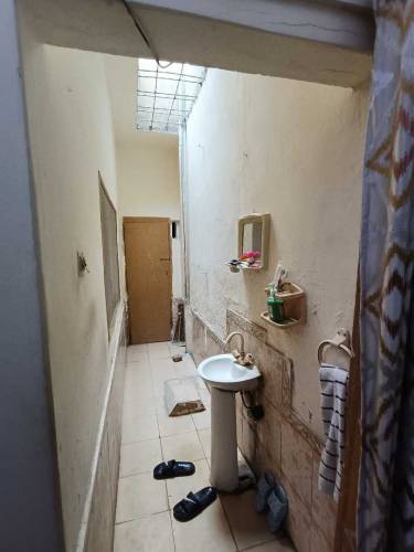 Single story home in Pak Kausar Town, Malir for sale.