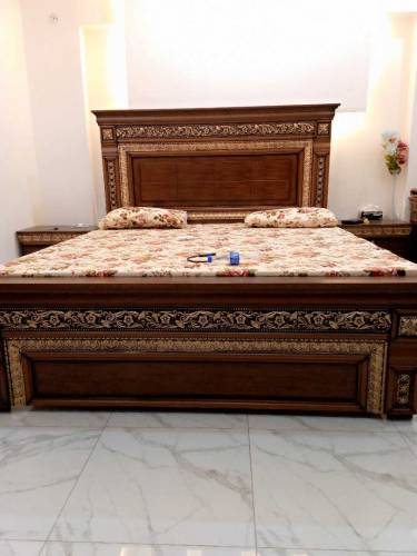 bed with dressing table with dianing table