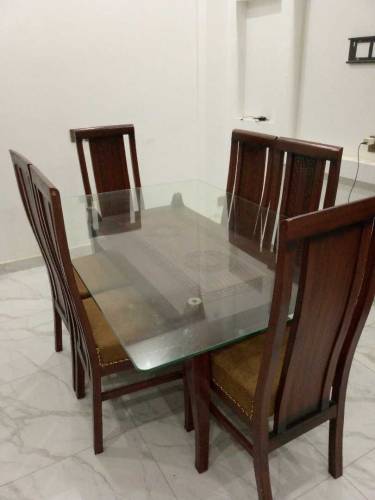 bed with dressing table with dianing table