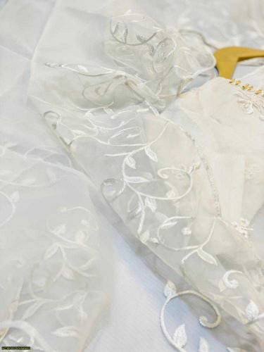 •  Fabric: Organza•  Product Type: Suit•  Pattern: Embroidered•  Neckl