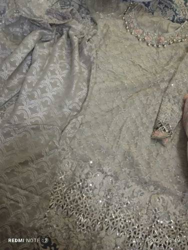 a very beautiful 3 piece stitched dress