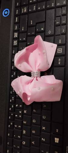 beautiful plain and fancy bow pin