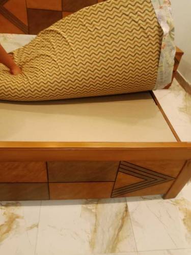 Double bed with side table