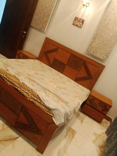 Double bed with side table