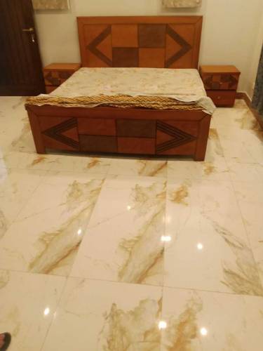 Double bed with side table