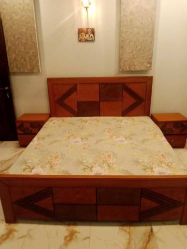 Double bed with side table