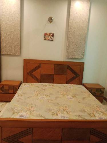 Double bed with side table