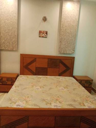 Double bed with side table