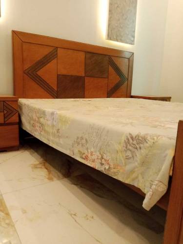 Double bed with side table