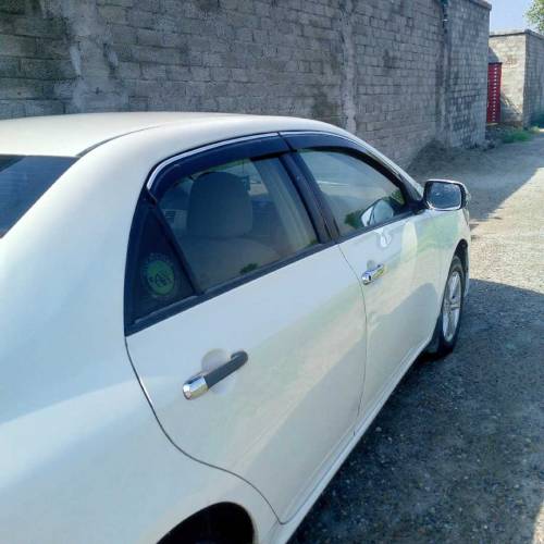car for sale Toyota Corolla 2009 model white colour