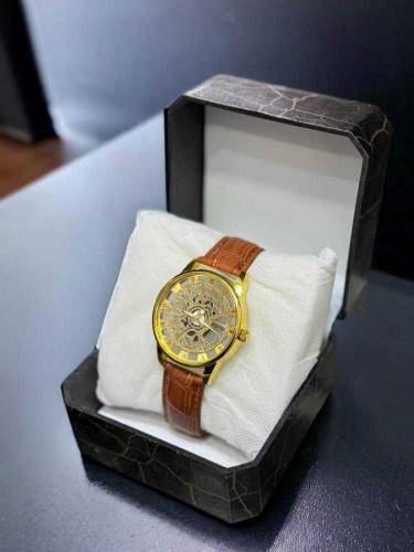 dail watch with leather straps