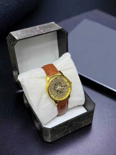 dail watch with leather straps