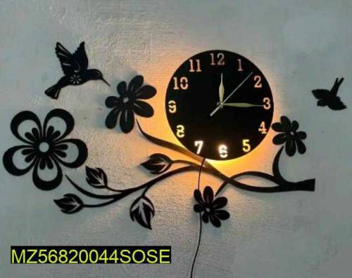 Analogue wall clock with lights