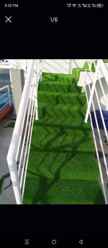 Artificial grass with fitting 