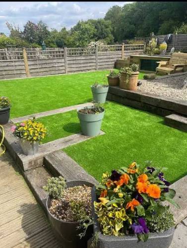 Artificial grass with fitting 