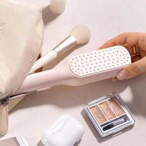 Self cleaning hair brush 