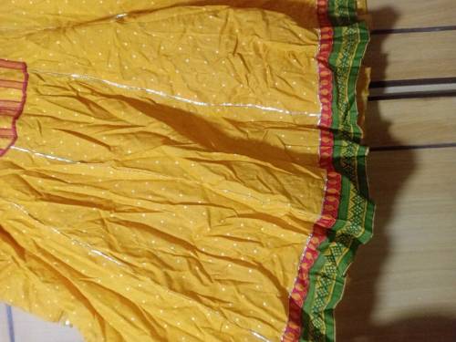 Yellow Frok with potli 
