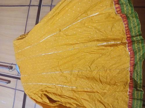 Yellow Frok with potli 