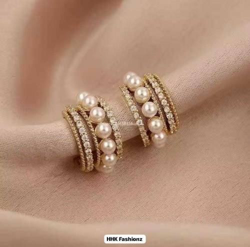 Beautiful Pearl Hoops EaringsAvailable In Golden And Sliver Color Pric