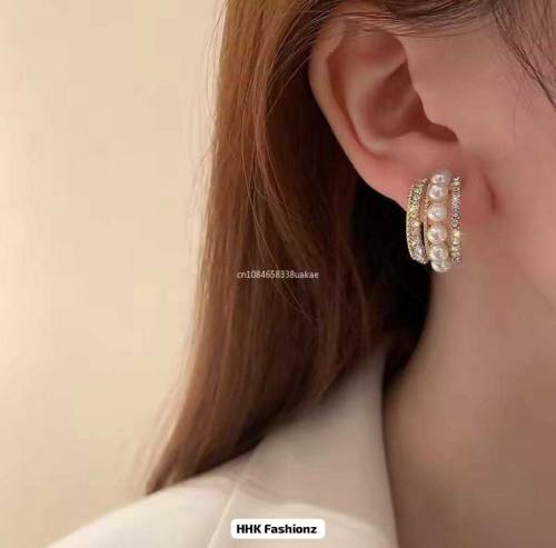 Beautiful Pearl Hoops EaringsAvailable In Golden And Sliver Color Pric