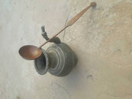 Antique ladle and water pot